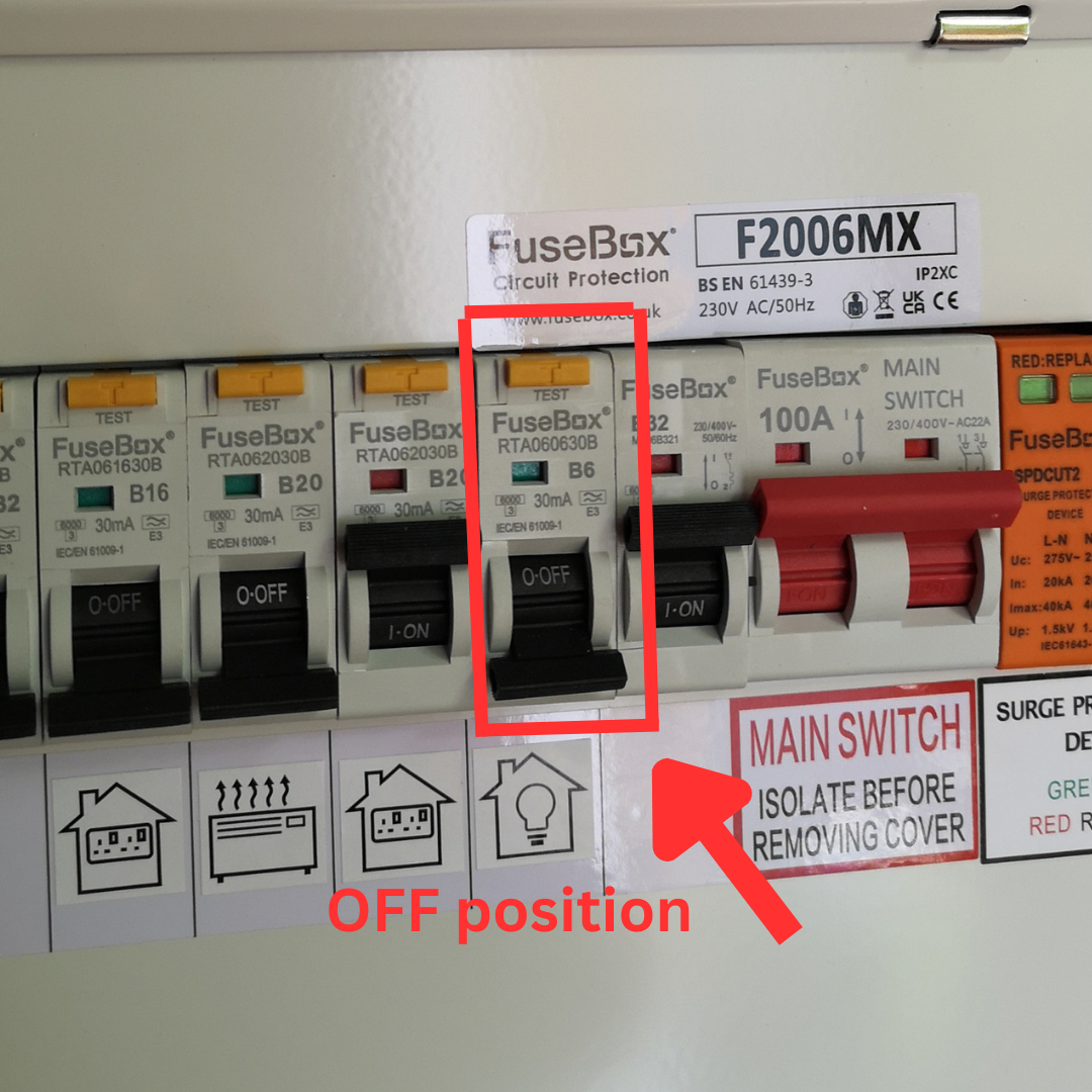 circuit breaker is switched to the middle off position, indicating it has tripped